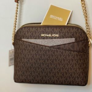 Micheal Kors Brown and Gold Crossbody purse.